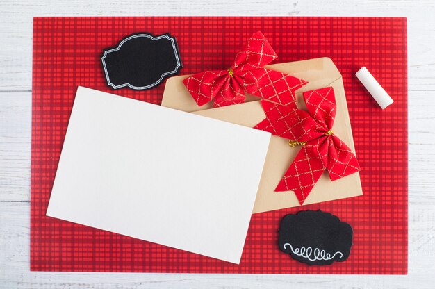 Blank craft envelope on red