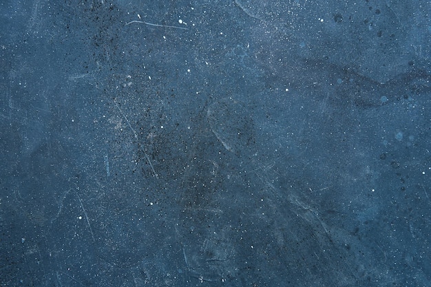 空白の濃い青のテクスチャ表面の背景白と黒の斑点抽象的な建築素材