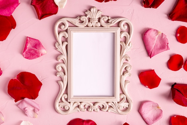 Blank decorative frame with rose petals