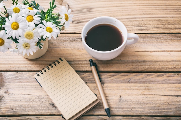 Premium Photo | Blank empty notebook wooden background view from above
