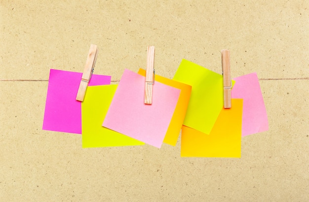 Photo blank envelope hanging on rope on wooden clothespin