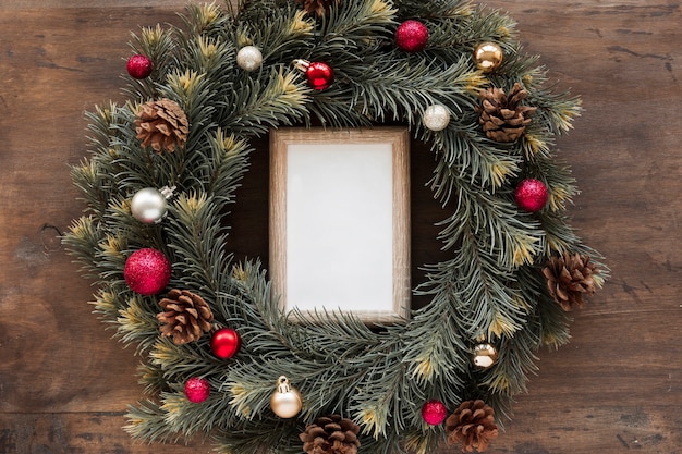 Photo blank frame in christmas wreath