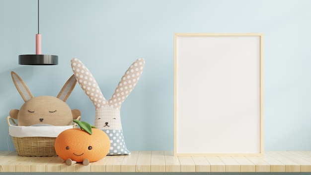 blank frame and and toys in child room interior with blue wall background,3D rendering