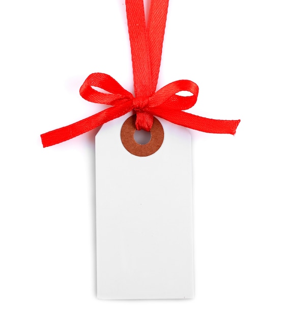 Blank gift tag with bow isolated on white