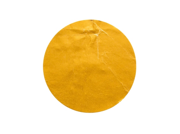 blank golden round adhesive paper sticker label isolated on white background