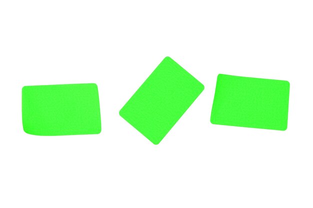 Photo blank green sticky notes isolated on a white background