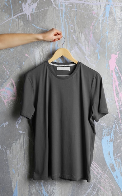 Blank grey t-shirt on grunge