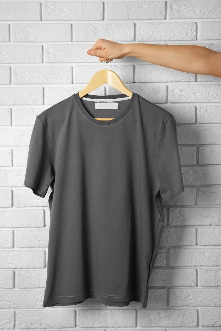 Photo blank grey tshirt against brick wall