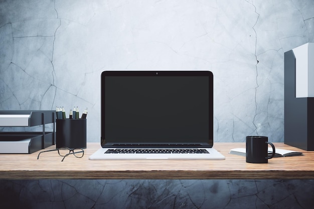 Blank laptop on the desk with cup of coffee