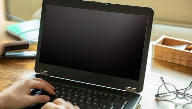 Blank laptop screen man work at home office open computer\
notebook black empty display