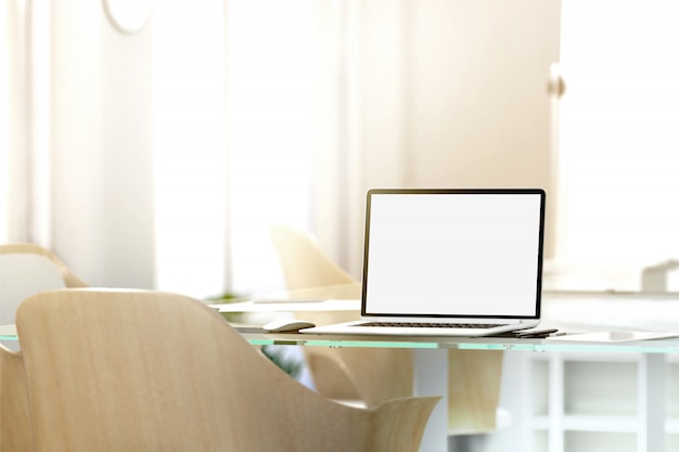 Blank laptop screen  in office, depth of field effect,