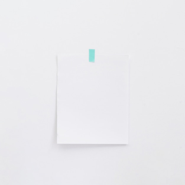 Blank memo on white wall 