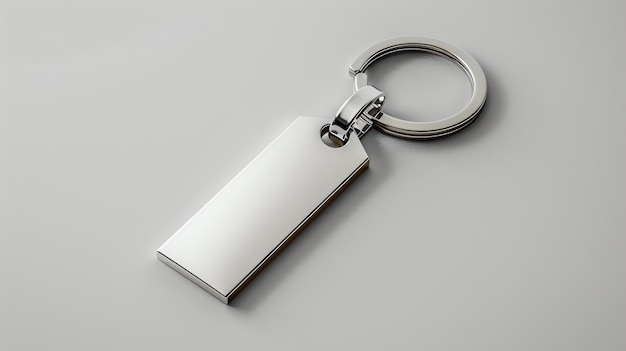 Photo blank metal keychain isolated on white background 3d rendering of a key ring