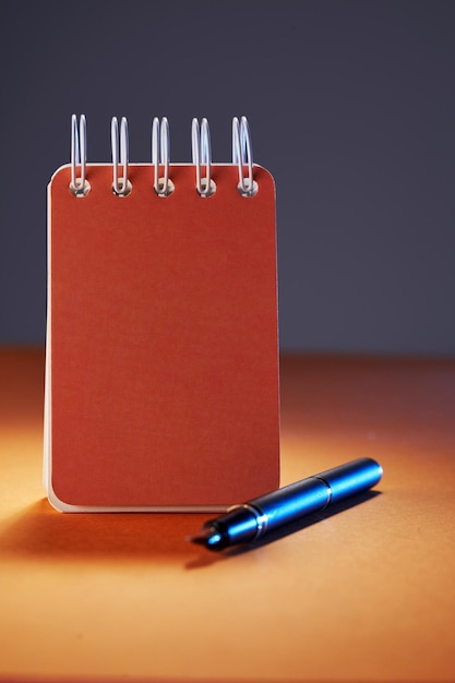 Blank note pad with pen for copy space