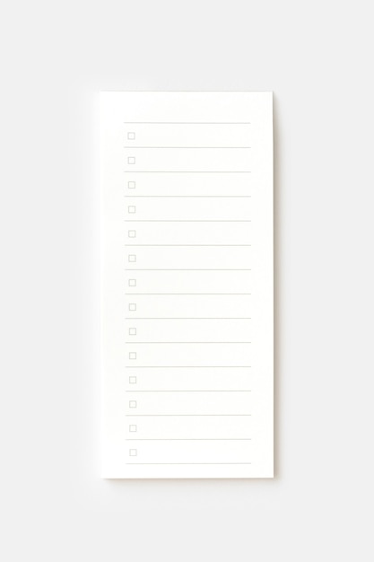 Blank note paper pad isolated on white with clipping path. Close-up.