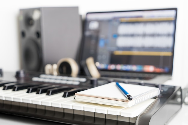 Blank notebook on music studio for song writing