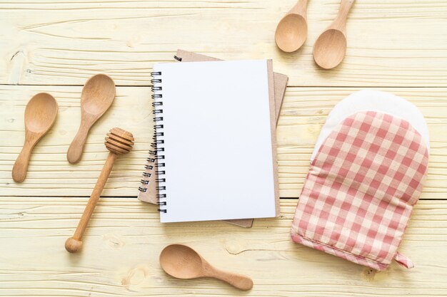 blank notebook for text note on wooden surface