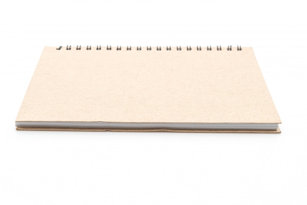 blank notebook on white wall