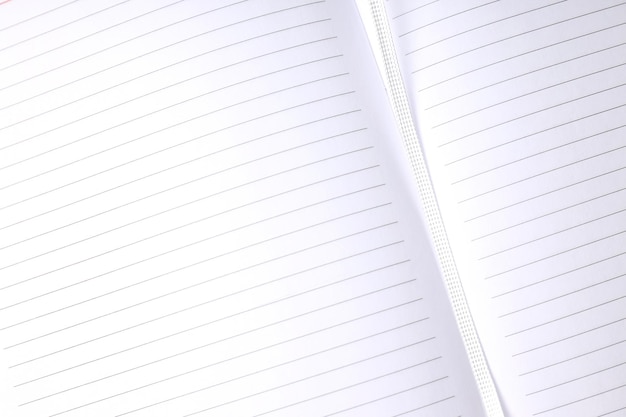 Blank notebook on whole background close up