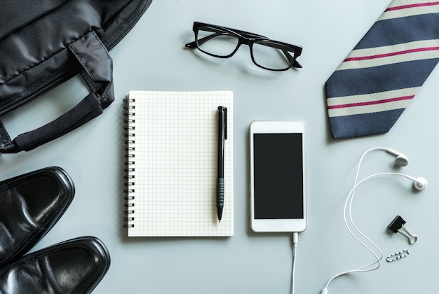 Blank notebook with cellphone desk office