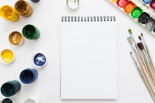 blank notebook with drawing tools