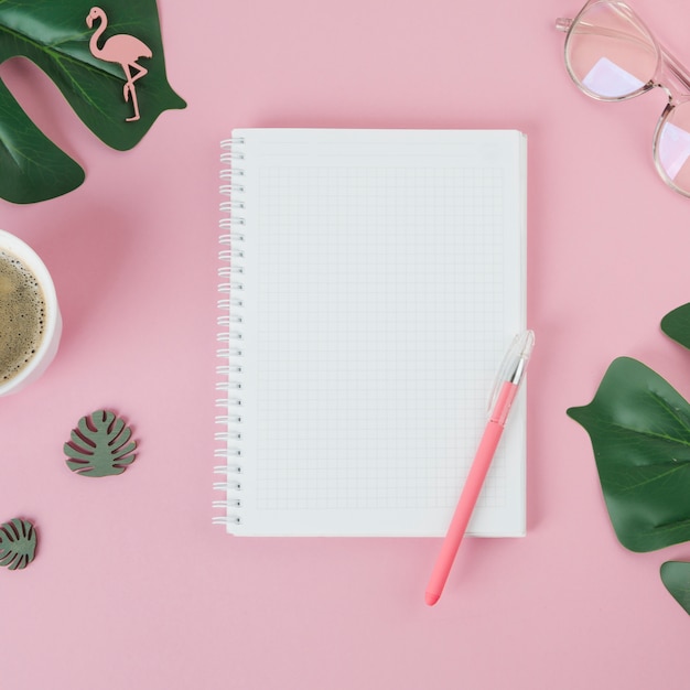 Blank notebook with pen on table