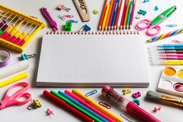 Blank notebook with School office supplies on a desk with copy space Back to school concept