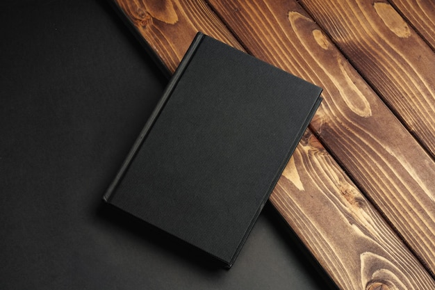 Blank notepad on a brown wooden surface