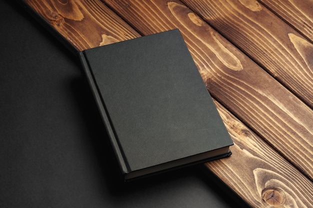 blank notepad on a brown wooden surface