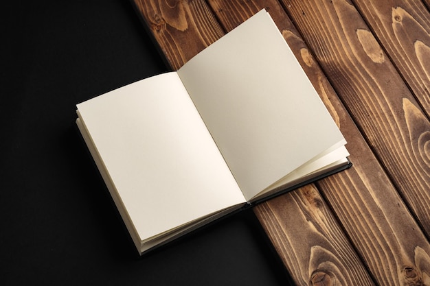 Blank notepad on a brown wooden surface