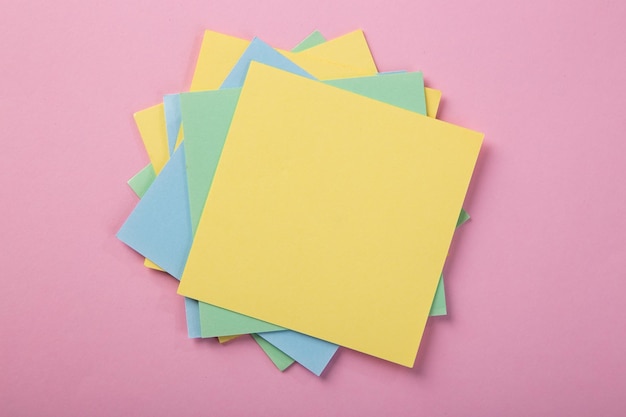 Blank notepad on color background