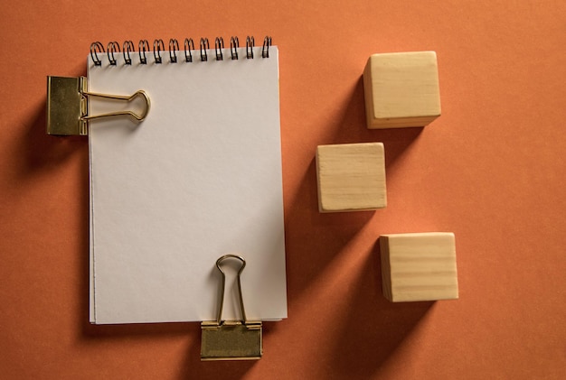 Blank notepad and cubes