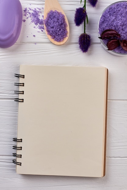 Blank notepad with purple spa stuff for health