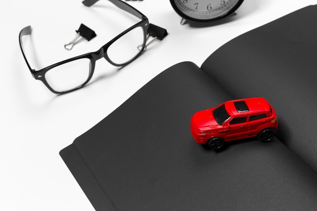 Blank office desk with red car