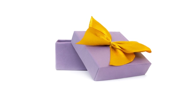 Blank open purple gift box with yellow ribbon bow isolated on white background