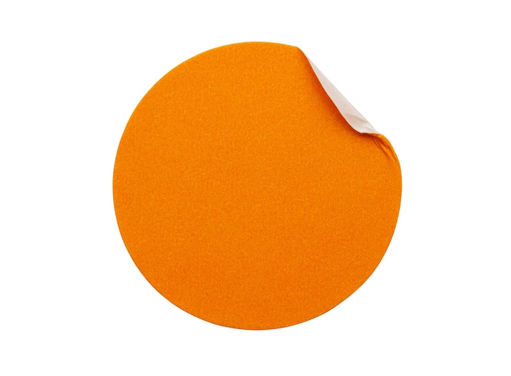 Photo blank orange round adhesive paper sticker label isolated on white background