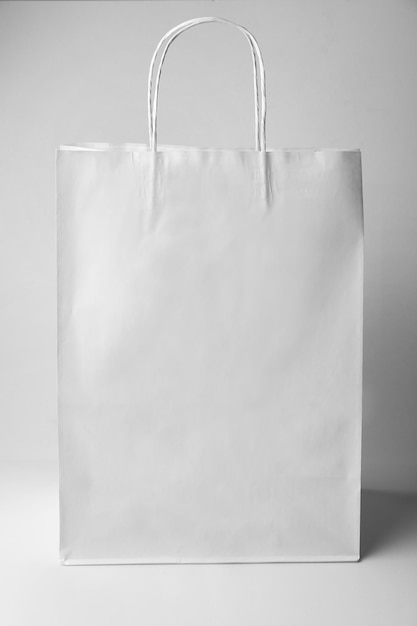 Blank paper bag on white background