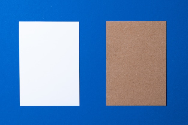 Blank paper business mock up on classic blue background