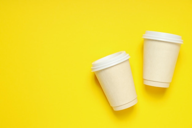 Blank paper cups composition for delivery and take away concept space for text