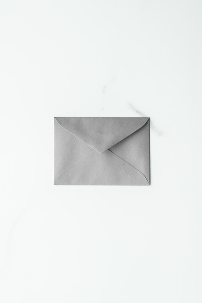 Photo blank paper envelopes on marble flatlay background holiday mail letter or post card message design