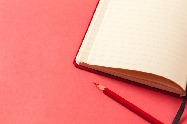 Blank paper pieces  on a colored pink background