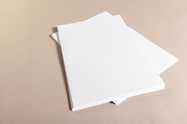 Photo blank paper pieces for mock up on a beige background