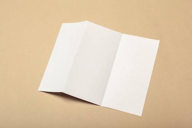 Photo blank paper pieces for mock up on a beige background