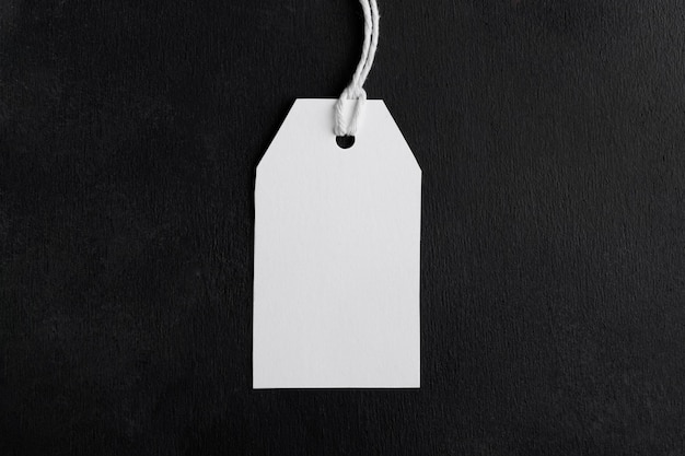 blank paper rectangular price tag mockup isolated on black background sale and black friday concept