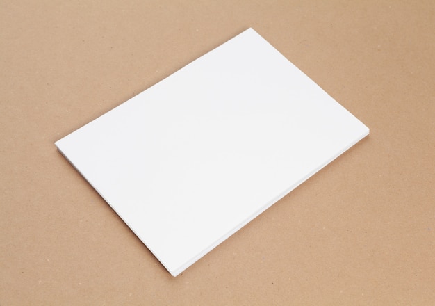 Фото Чистый лист бумаги, вид сверху, плоская планировка