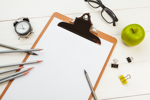 Blank paper on wooden clipboard