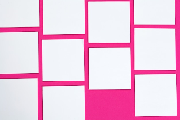 Photo blank papers on pink background