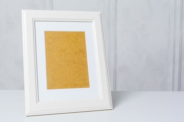 Blank photo frame on the table