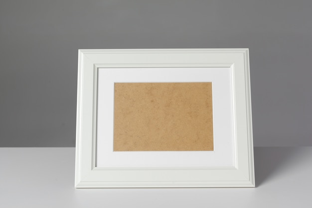 Blank photo frame on the table