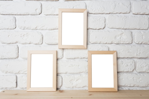 Blank photo frames on the wall